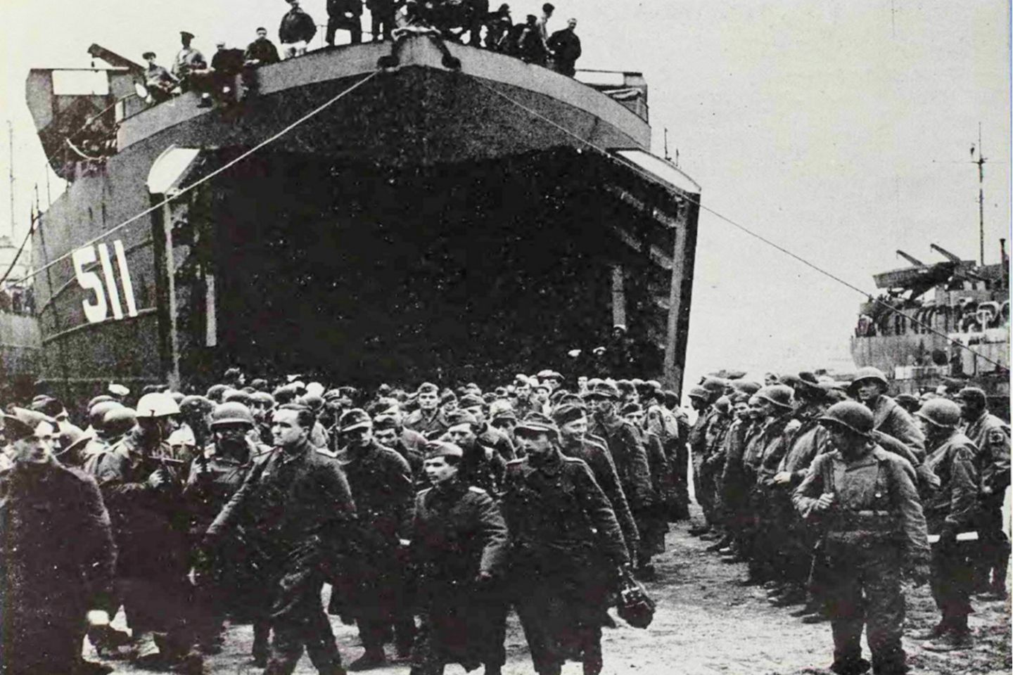 USS LST511 offloading German POWs at a British port in 1944.