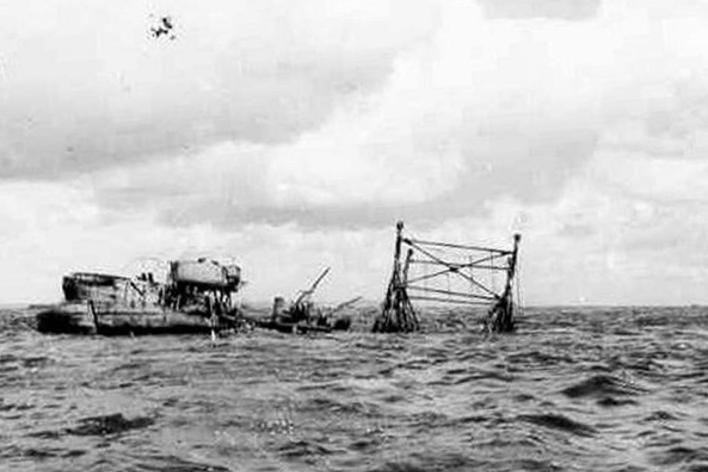 The sunken hulk of USS LST-496 off Omaha Beach.